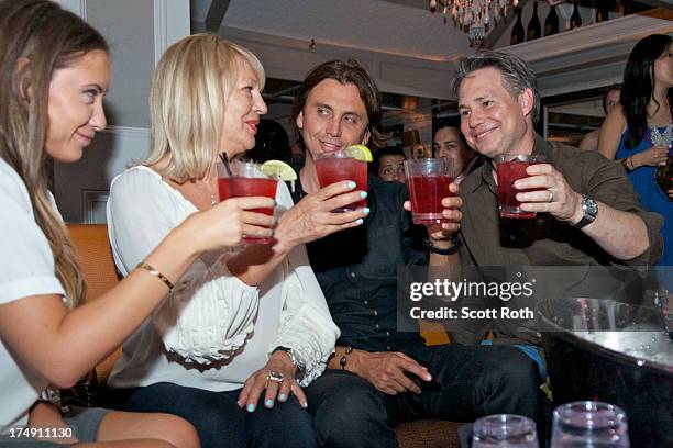 Anat Popovsky, Galina Cheban, Jonathan Cheban, and Jason Binn attend the 2013 Summer Soiree at Pink Elephant on July 27, 2013 in Southampton, New...