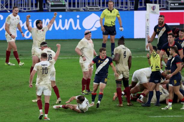 England's players celebrate their victory at the end of the France 2023 Rugby World Cup third-place match between Argentina and England at the Stade...