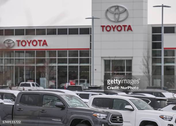 Toyota logo and vehicles outside a Toyota dealership in Edmonton, on October 26 in Edmonton, Alberta, Canada.