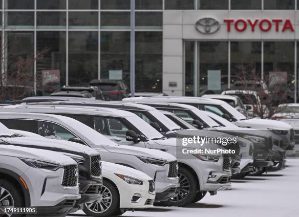 Toyota logo and vehicles outside a Toyota dealership in Edmonton, on October 26 in Edmonton, Alberta, Canada.