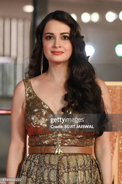 Bollywood actress Diya Mirza poses upon her arrival for the opening ceremony of "Jio MAMI Mumbai Film Festival 2023" in Mumbai on October 27, 2023.