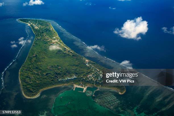 Aerial view on Maldives islands. Gaafu Alifu Atoll. Disappearance of islands. Refugees due to climate change. The sea level rises year after year and...