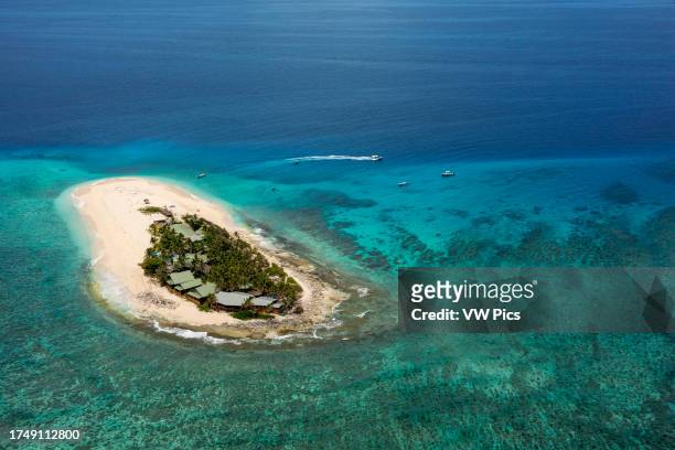 Namotu Island Mamanuca Islands, Fiji, South Pacific - aerial view. Disappearance of islands. Refugees due to climate change. The sea level rises year...