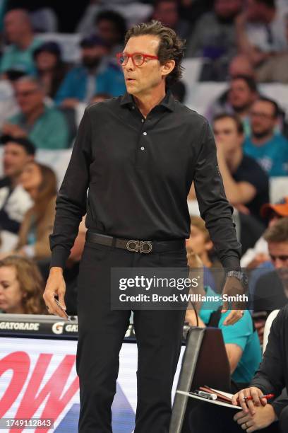 Head Coach Quin Snyder of the Atlanta Hawks looks on during a game against the Charlotte Hornets on October 25, 2023 at Spectrum Center in Charlotte,...