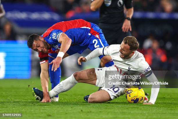 Joel Ward of Crystal Palace catches the sock of James Maddison of Tottenham Hotspur with his studs during the Premier League match between Crystal...