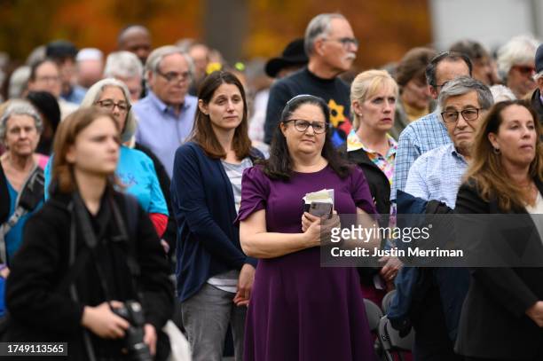 People join family members of victims and survivors of the Tree of Life synagogue attack during the Commemoration Ceremony on the fifth anniversary...