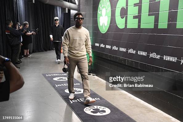 Kyle Lowry of the Miami Heat arrives to the arena before the game ...