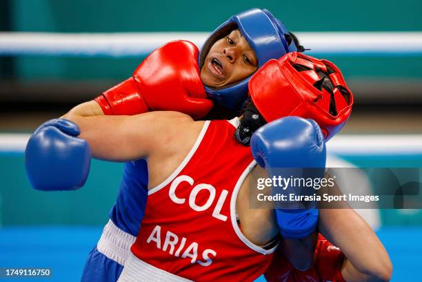 Brazilian Tatiana Regina de Jesus Chagas and Colombian Yeni Arias compete for the gold medal in women's boxing under 54kg on Day 7 of Santiago 2023...