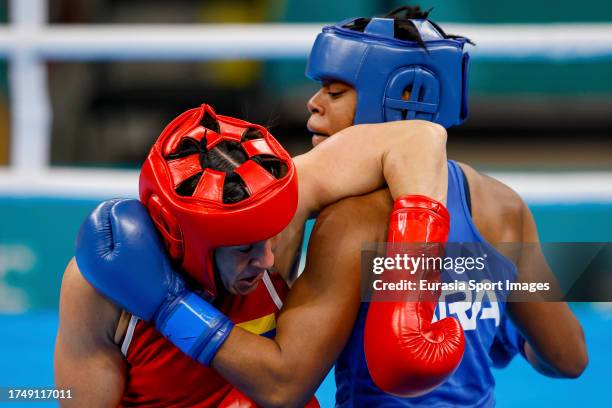 Brazilian Tatiana Regina de Jesus Chagas and Colombian Yeni Arias compete for the gold medal in women's boxing under 54kg on Day 7 of Santiago 2023...