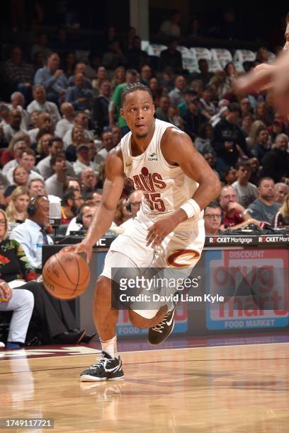 Isaac Okoro of the Cleveland Cavaliers dribbles the ball during the game against the Oklahoma City Thunder on October 27, 2023 at Rocket Mortgage...