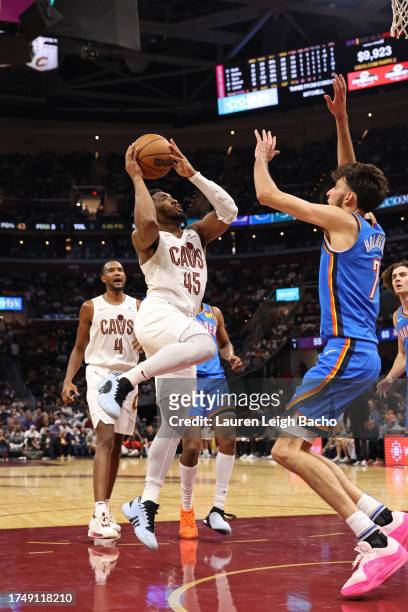 Donovan Mitchell of the Cleveland Cavaliers drives to the basket during the game Oklahoma City Thunder on October 27, 2023 at Rocket Mortgage...