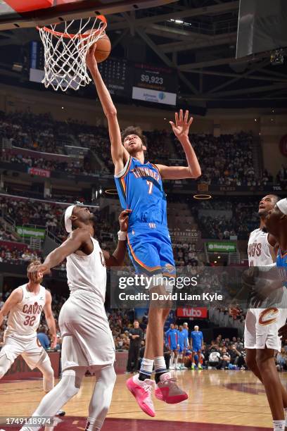 Chet Holmgren of the Oklahoma City Thunder drives to the basket during the game against the Cleveland Cavaliers on October 27, 2023 at Rocket...