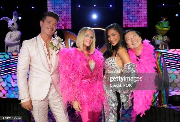 Robin Thicke, Jenny McCarthy, Nicole Scherzinger and Ken Jeong in the "Elton John Night"episode of THE MASKED SINGER airing Wednesday, Oct. 18 on FOX.