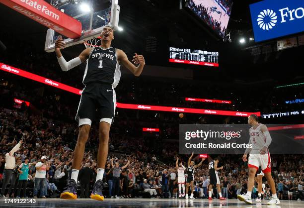 Victor Wembanyama of the San Antonio Spurs celebrates after they defeated the Houston Rockets in overtime at Frost Bank Center on October 27, 2023 in...