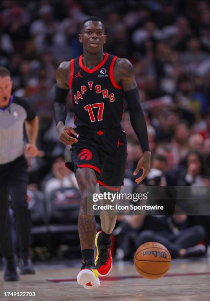 Toronto Raptors guard Dennis Schroder brings the ball up court during a NBA game between the Toronto Raptors and the Chicago Bulls on October 27,...