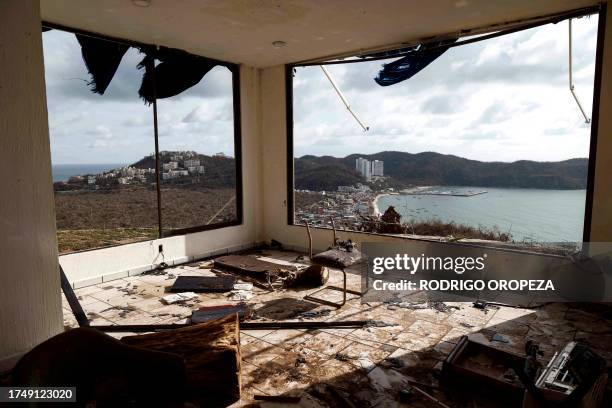 Damaged office surrounded by debris is pictured in the aftermath of hurricane Otis in Acapulco, Guerrero State, Mexico, on October 27, 2023. Airlines...