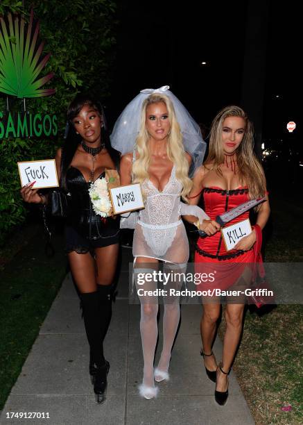 Chelsea Lazkani, Emma Hernan and Chrishell Stause are seen at "Casamigos" Halloween Party. On October 27, 2023 in Los Angeles, California.