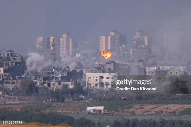Image is a frame taken from a Video Clip) Smoke rises from an explosion in Gaza on October 28, 2023 seen from Sderot, Israel. In the wake of the Oct....