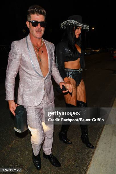 Robin Thicke and April Love Geary are seen at "Casamigos" Halloween Party. On October 27, 2023 in Los Angeles, California.