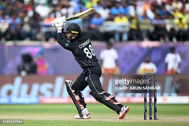 New Zealand's Devon Conway plays a shot during the 2023 ICC Men's Cricket World Cup one-day international match between Australia and New Zealand at...