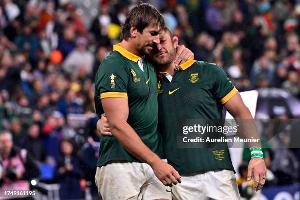 Eben Etzebeth and Duane Vermeulen of South Africa react after winning the Rugby World Cup France 2023 match between England and South Africa at Stade...