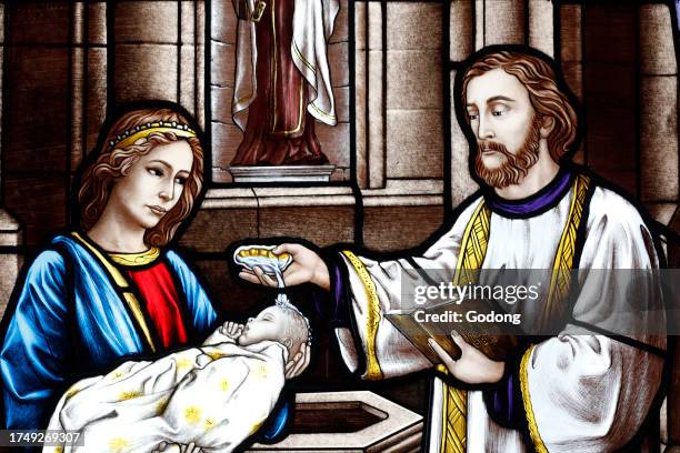 Sanctuary of La Benite Fontaine. Catholic mass. Altar boy at eucharist celebration. France.