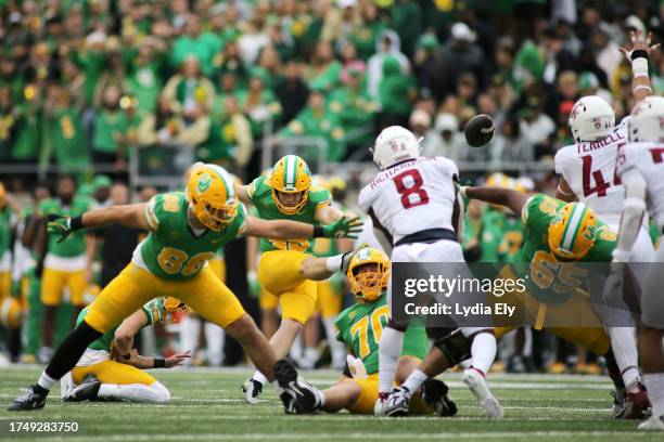 Camden Lewis of the Oregon Ducks kicks a missed field goal attempt against the Washington State Cougars at Autzen Stadium on October 21, 2023 in...