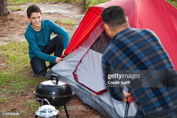 hispanic father and son, camping - kid baseball pitcher stock pictures, royalty-free photos & images