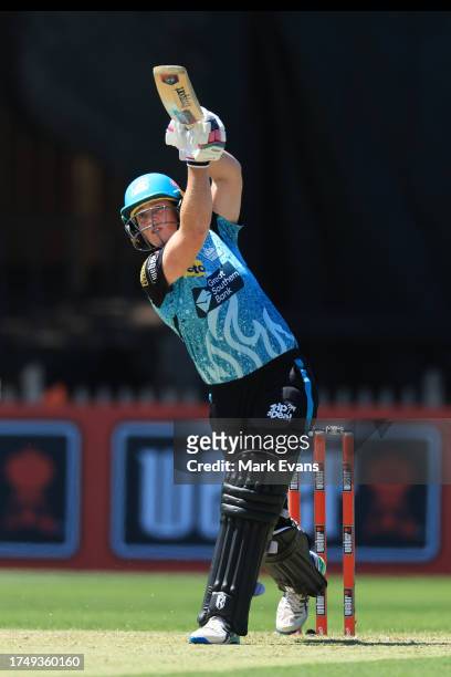 Grace Harris of the Heat hits four runs during the WBBL match between Perth Scorchers and Brisbane Heat at North Sydney Oval, on October 22 in...