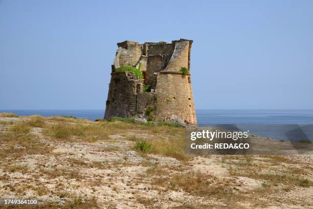 Watchtower against pirates, commonly referred to as Saracen tower along the Salento coast between Castro and Santa Cesarea Terme, Apulia, Italy,...