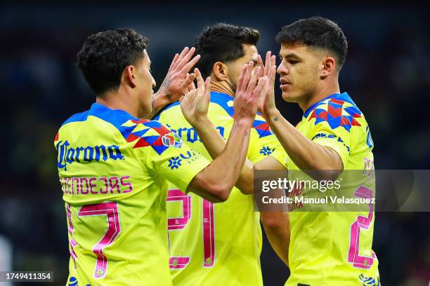 Alejandro Zendejas of America celebrates with Richard Sánchez of America after scoring the team's fourth goal during the 13th round match between...