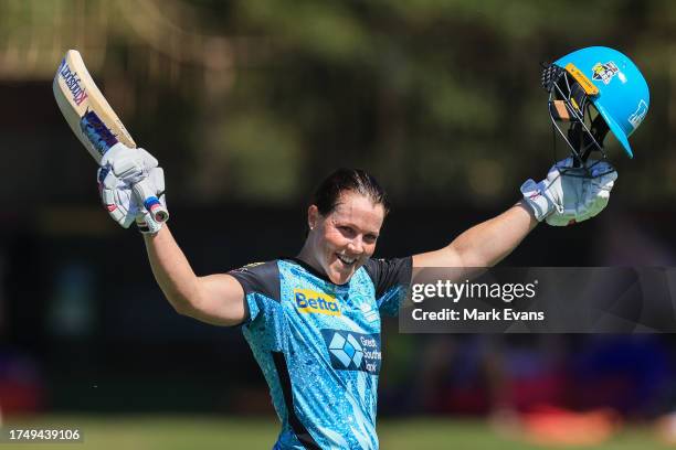 Grace Harris of the Heat celebrates a century during the WBBL match between Perth Scorchers and Brisbane Heat at North Sydney Oval, on October 22 in...