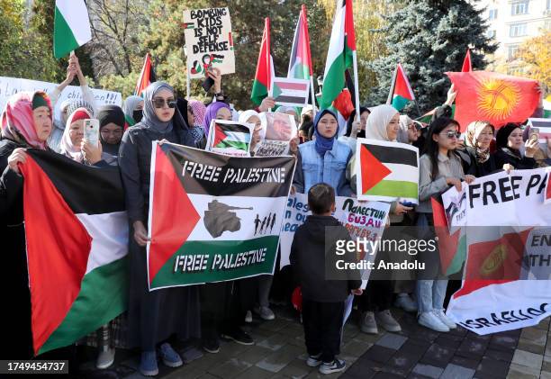 People gather to show solidarity with Palestinians in the Gaza Strip and condemn recent actions by the government of Israel then material assistance...