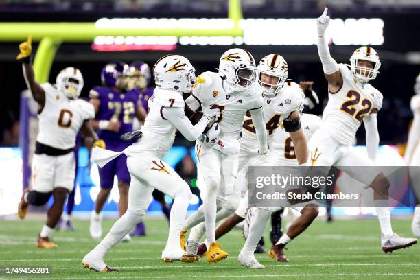 Ro Torrence of the Arizona State Sun Devils celebrates his interception against the Washington Huskies during the first quarter at Husky Stadium on...