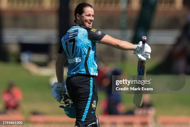 Grace Harris of the Heat celebrates a century during the WBBL match between Perth Scorchers and Brisbane Heat at North Sydney Oval, on October 22 in...