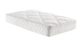 A white mattress with no bedding
