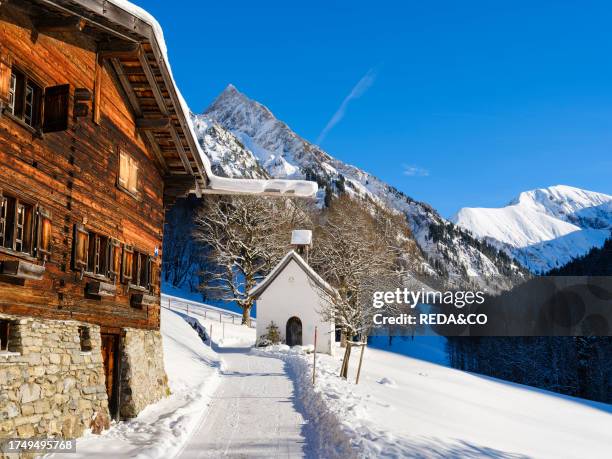 The chapel in village Gerstruben a listed collection of old farmhouses dating back to the 15. And 16. Century. The Allgaeu Alps near Oberstdorf...