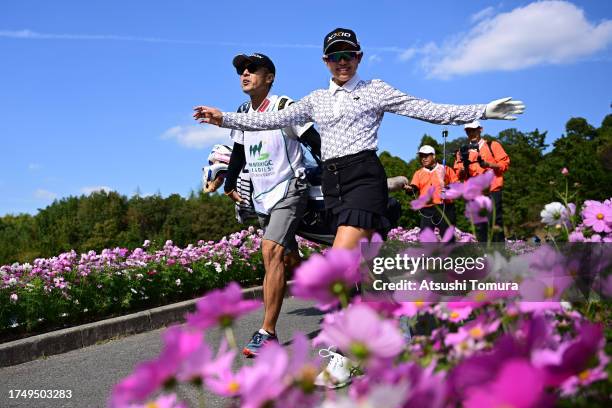 Nana Suganuma of Japan poses on the 16th hole during the final round of NOBUTA Group Masters GC Ladies at Masters Golf Club on October 22, 2023 in...