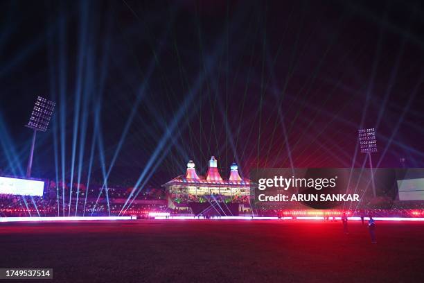 Light show is pictured at the end of the 2023 ICC Men's Cricket World Cup one-day international match between Australia and New Zealand at the...