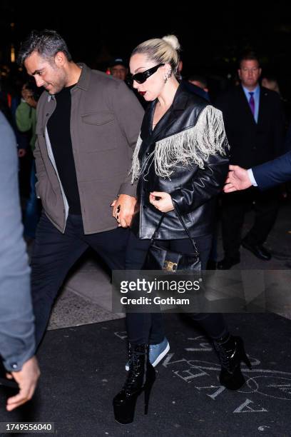 Lady Gaga and Michael Polansky are seen in Midtown on October 22, 2023 in New York City.