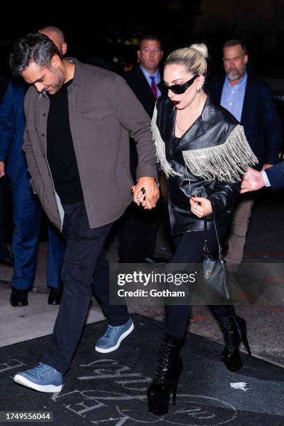 Lady Gaga and Michael Polansky are seen in Midtown on October 22, 2023 in New York City.