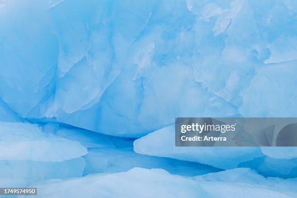 Blue ice abstract close-up of the Negribreen glacier at Spitsbergen, Svalbard .