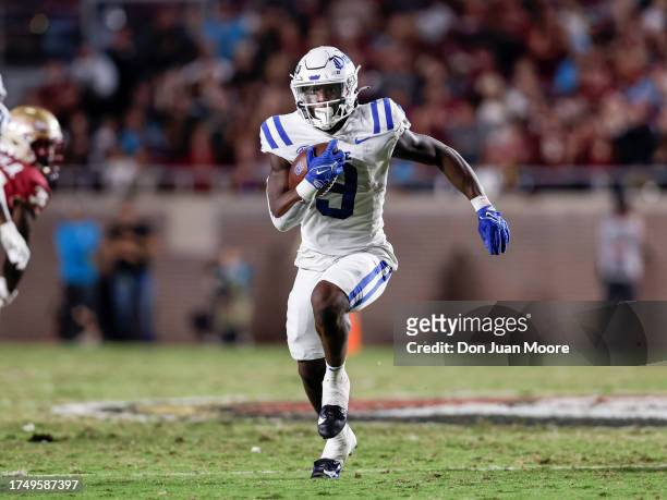 Runningback Jaquez Moore of the Duke Blue Devils runs with the ball during the game against the Florida State Seminoles at Doak Campbell Stadium on...