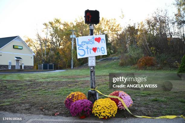 Sign reading "Lewiston Strong" is seen in Lewiston, Maine, on October 28, 2023 in the aftermath of a mass shooting. The suspect in a mass shooting...