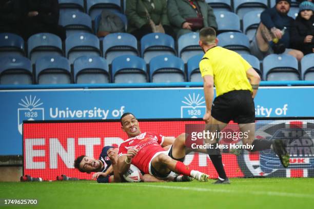 Matty Ashton of England scores their sides second try during the Autumn Test Series match between England and Tonga at John Smith's Stadium on...