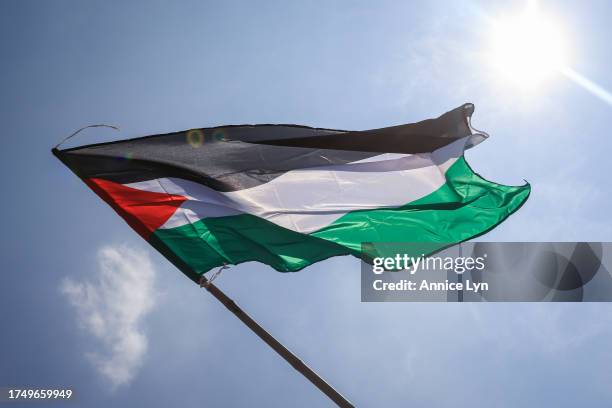 Palestinian flag is seen during a Freedom for Palestine rally at Merdeka Square on October 22 in Kuala Lumpur, Malaysia. On October 7, the...