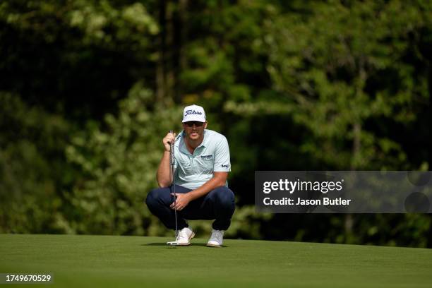 Andy Ogletree of the USA lines up his putt on hole 7 during the third round of the Asian Tour International Series England at Close House on August...