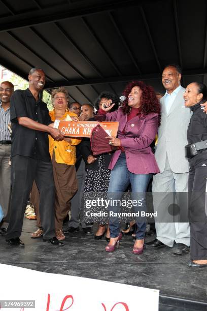 Singer Chaka Khan, performs for her hometown crowd after being presented the street sign "Chaka Khan Way" from Carl McKenzie after Blackstone Avenue...