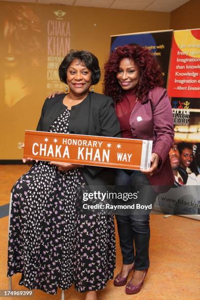 Singer Chaka Khan, poses with her mother Sandra Coleman with the street sign "Chaka Khan Way" after it was presented to her during a street renaming...