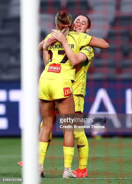 Mariana Speckmaier of the Phoenix celebrates scoring a goal with team mates during the A-League Women round two match between Western Sydney...